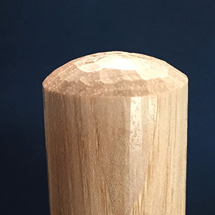 hand carved bo staff end detail